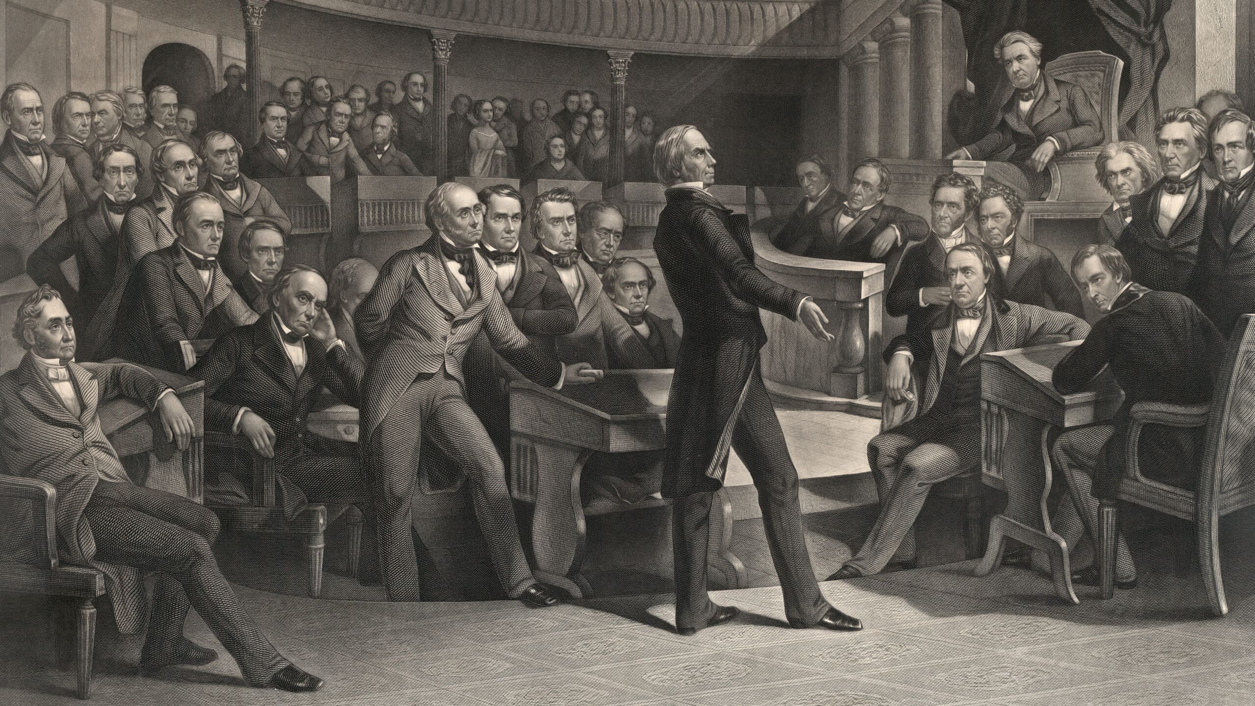 A historical illustration shows a man speaking passionately to a large group of seated men in formal 19th-century attire inside a grand, ornate chamber.